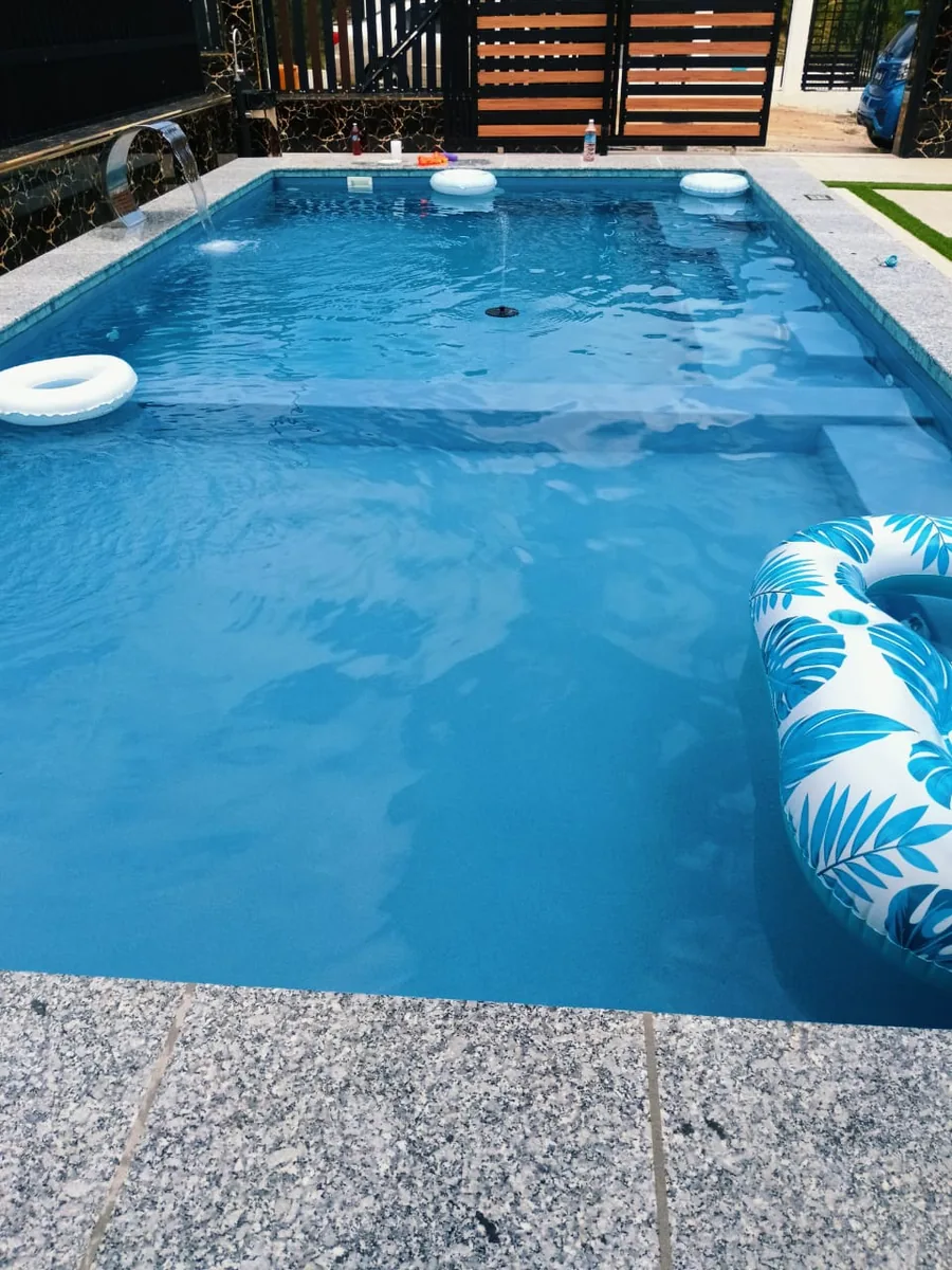 Completed family pool with clear water